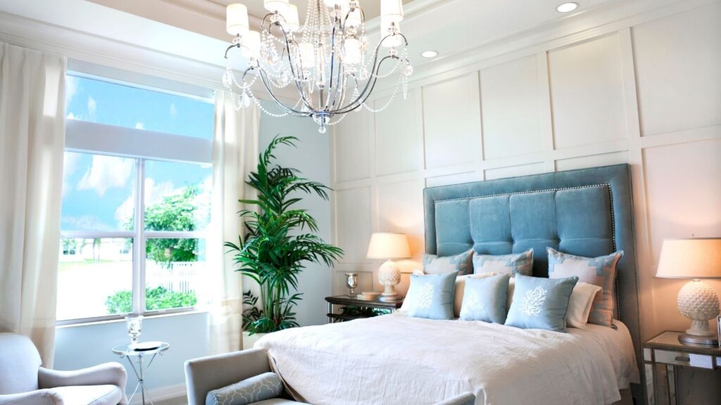 PANELED WALL WITH MODERN CHANDELIER