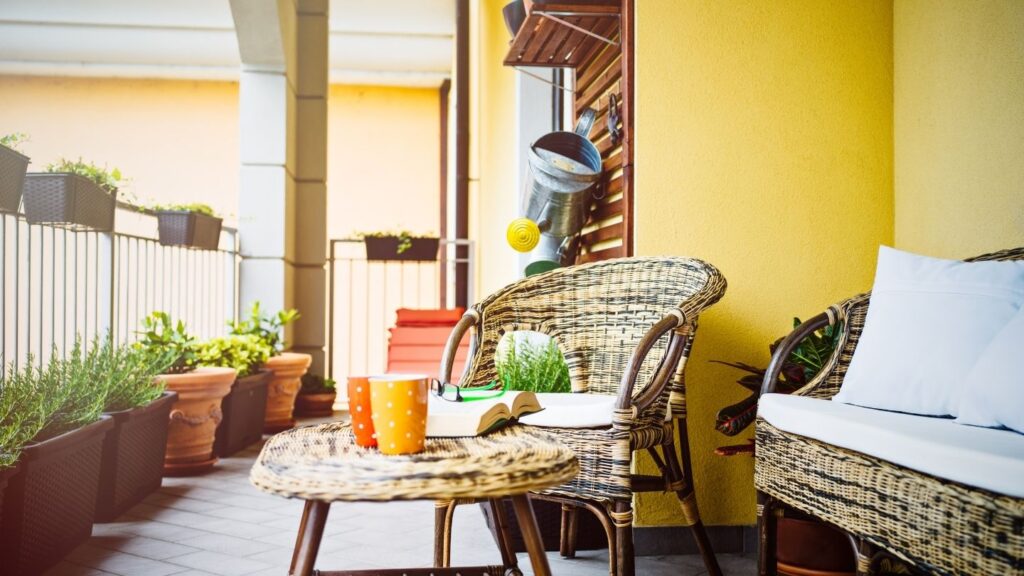 CANE SOFA ARMCHAIR AND COFFEE TABLE WITH SMALL HERB GARDEN