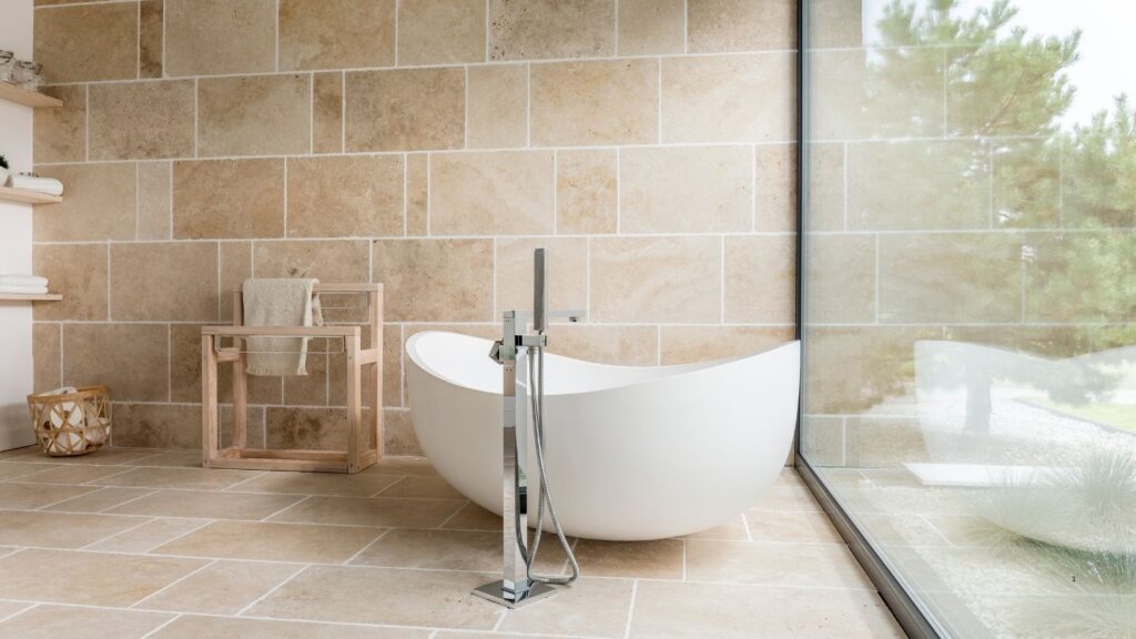 STONE TILED WALLFLOORING WITH FREE STANDING BATH